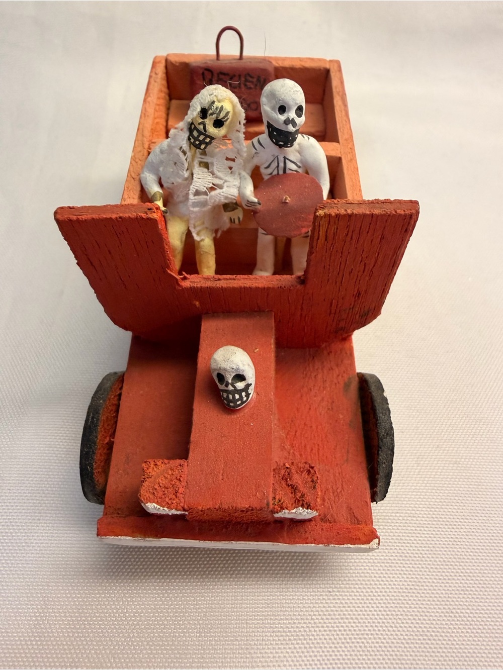 Day of the Dead Bride and Groom in Red Car with Luggage